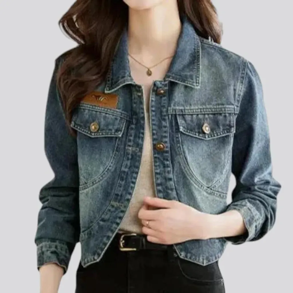 Asymmetric sanded jean jacket for women