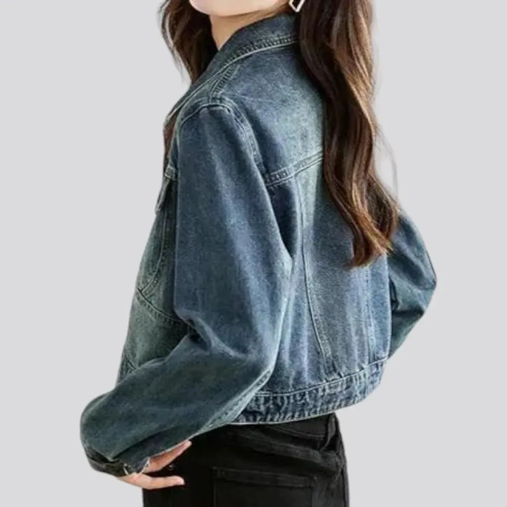 Asymmetric sanded jean jacket for women