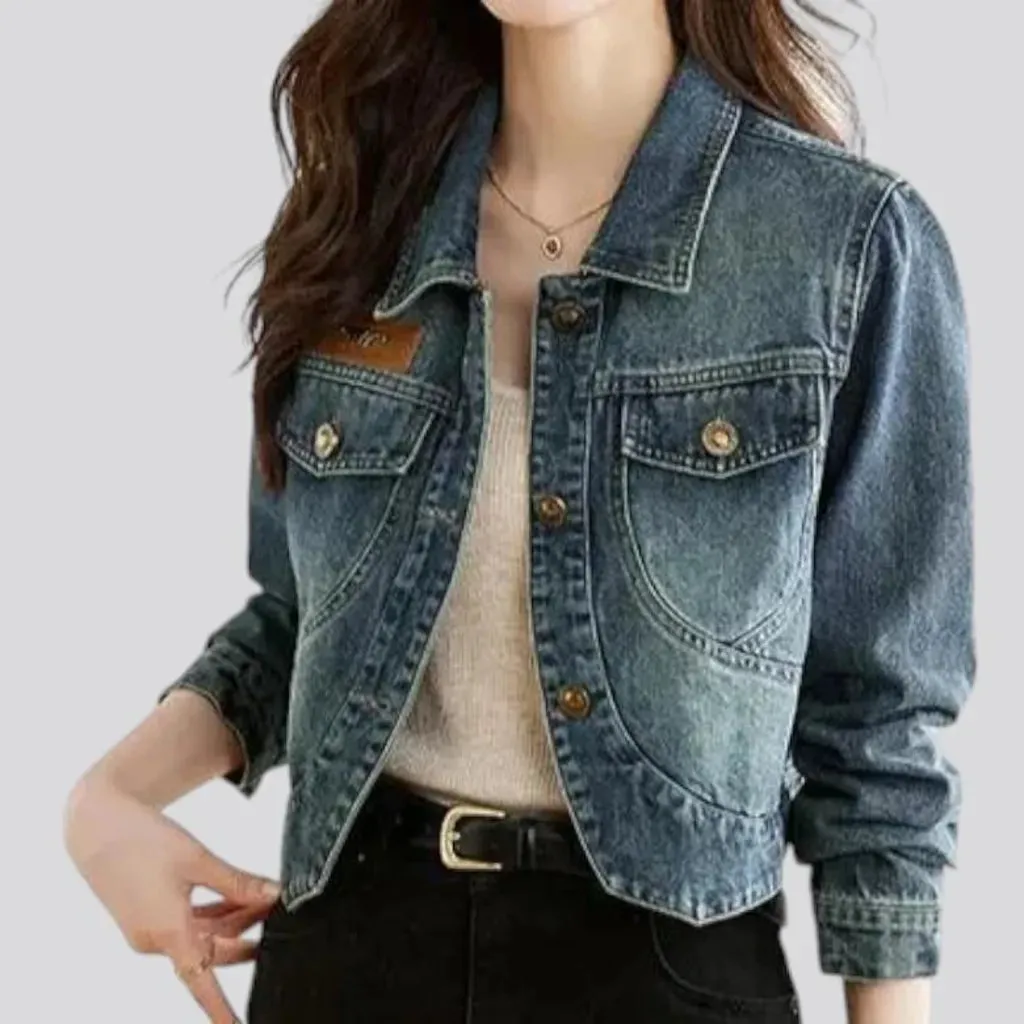 Asymmetric sanded jean jacket for women