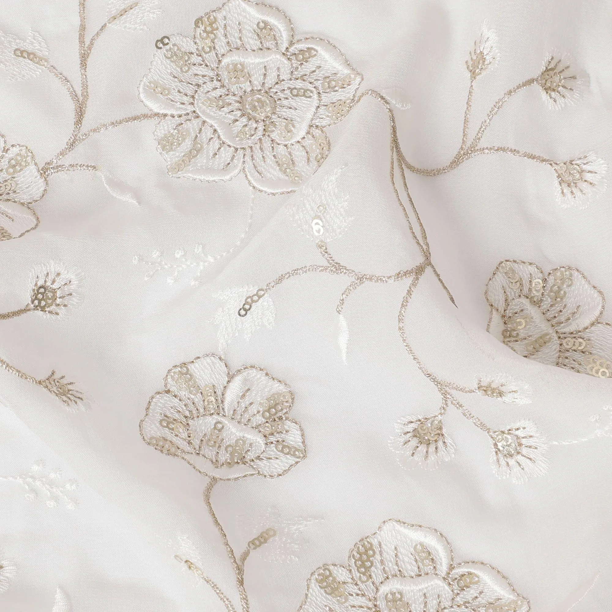 Off white synthetic georgette fabric with same tone and gold embroidery in floral design-D15820