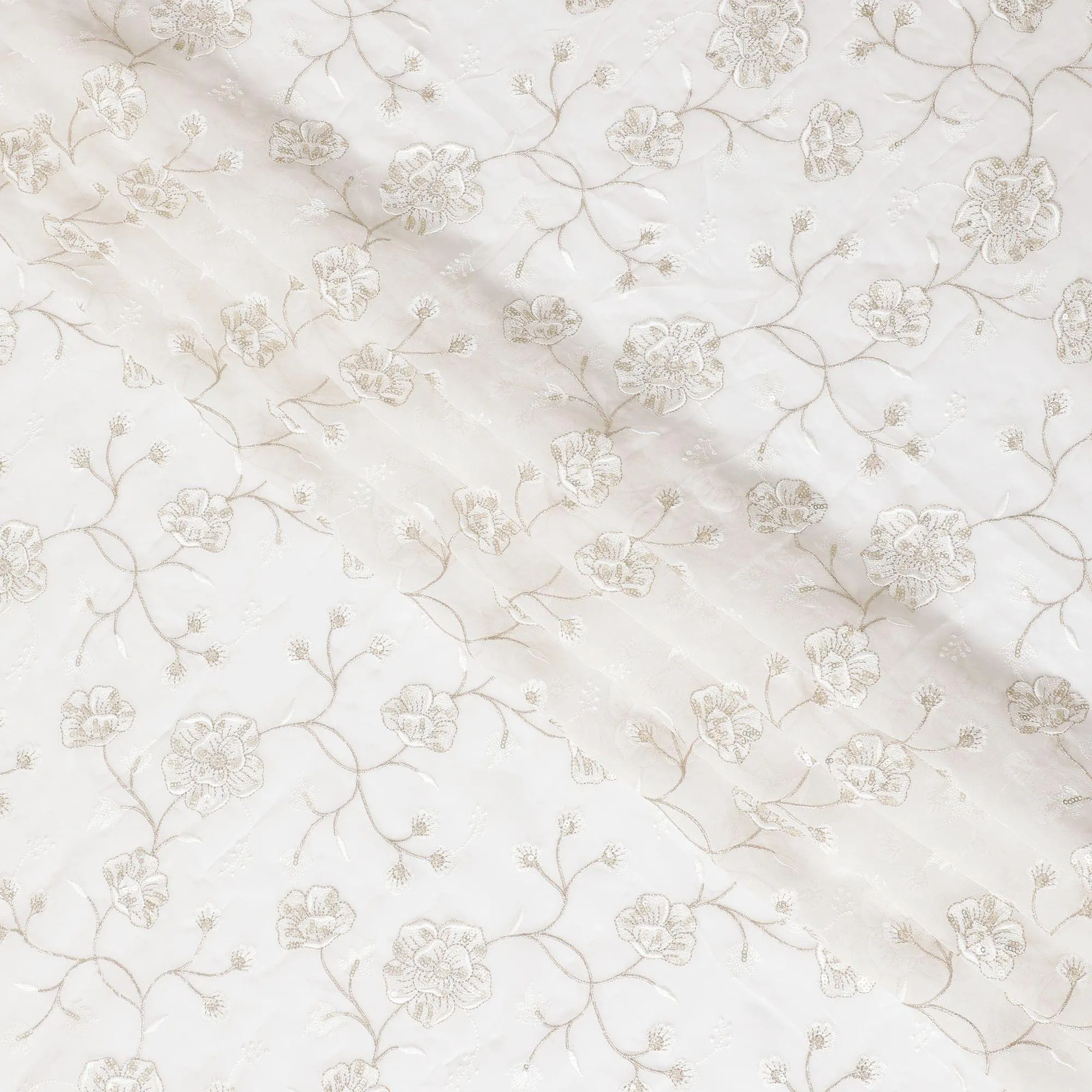 Off white synthetic georgette fabric with same tone and gold embroidery in floral design-D15820