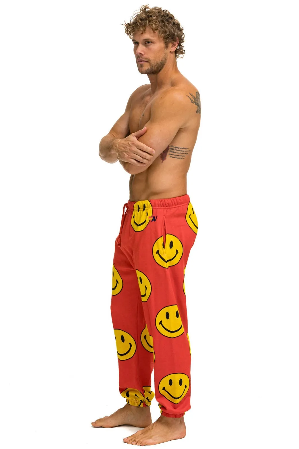 SMILEY REPEAT MENS SWEATPANTS - RED